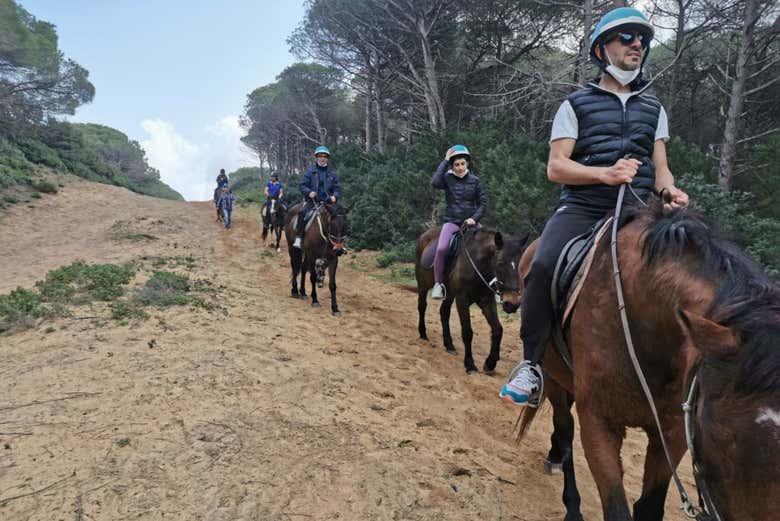 Paseo a caballo por la playa de Porto Ferro y el lago Baratz