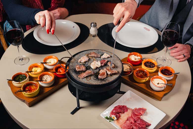 Comida o cena de fondue en el restaurante Casa Di Pietro