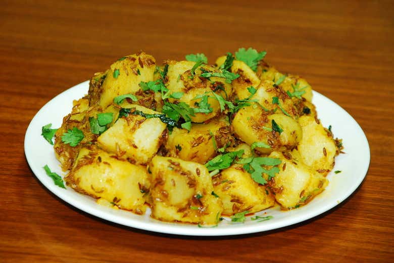 Clase de cocina y comida con una familia india